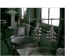 Ceramic shell mold production